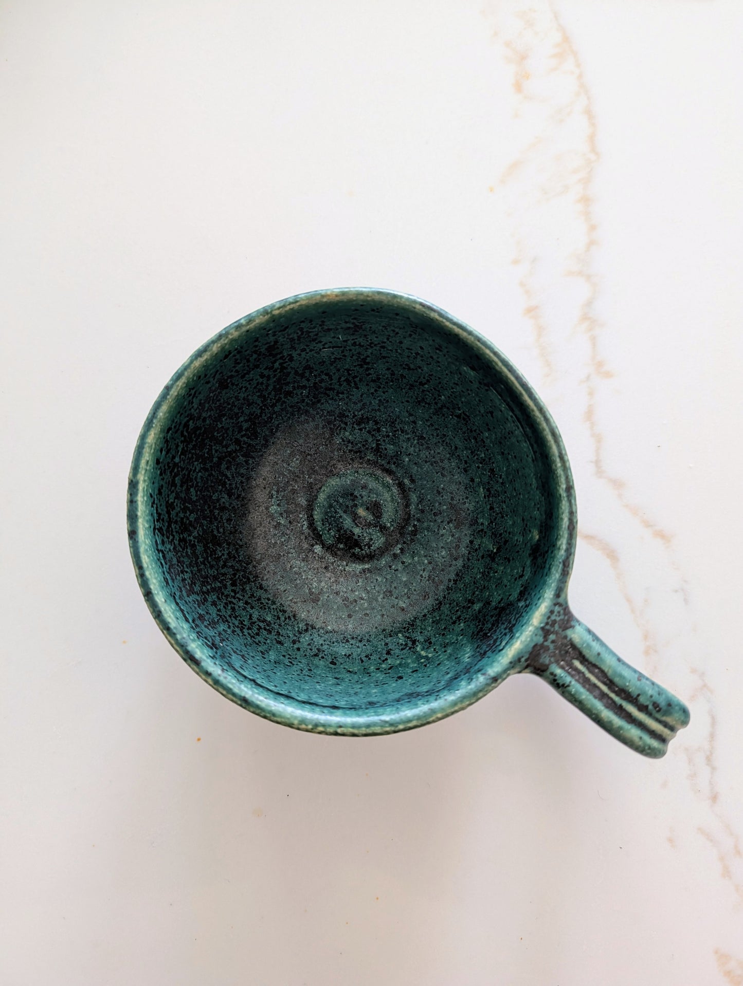 Speckled green mug
