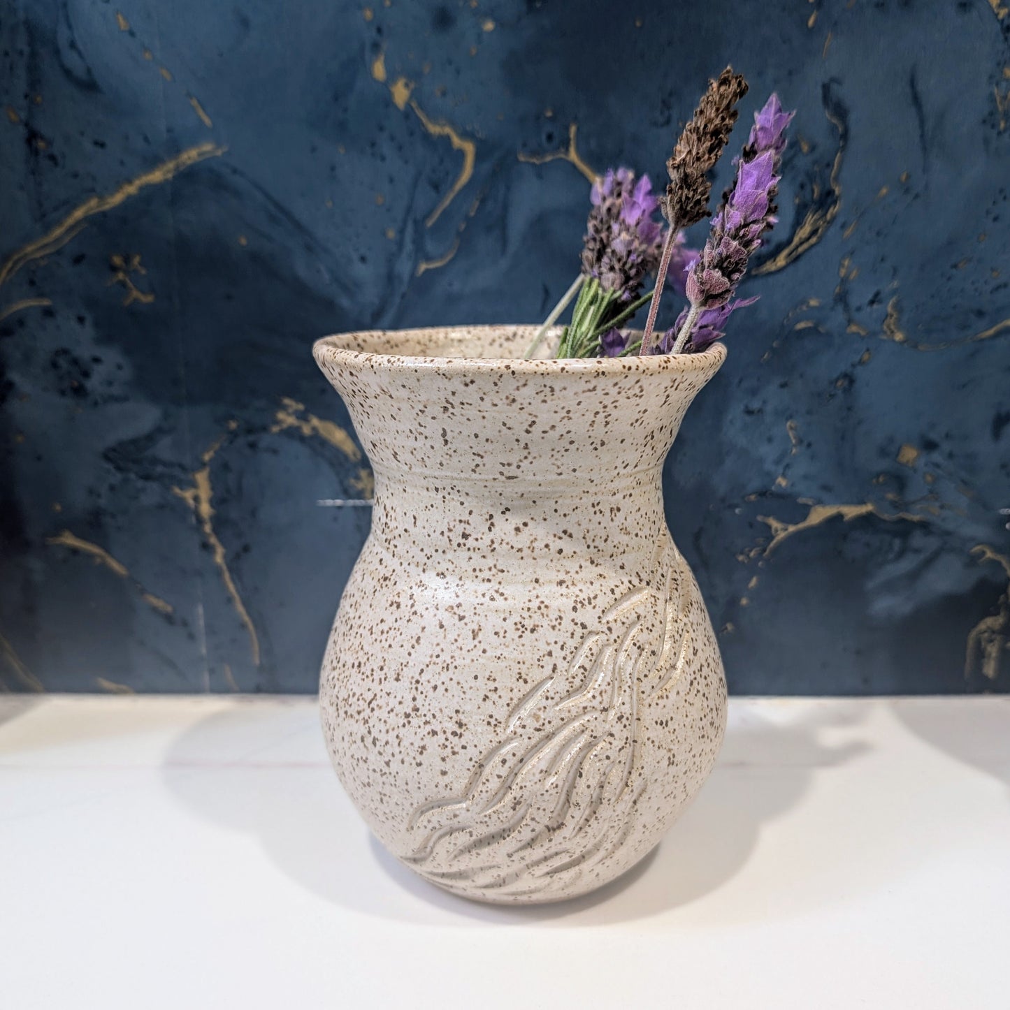 Small speckle bouquet vase with carvings